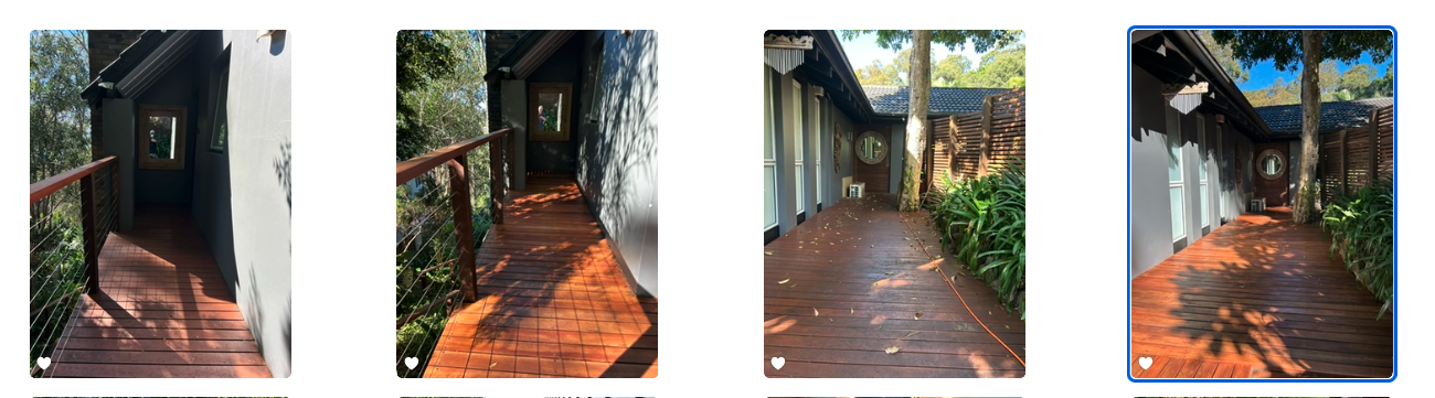 Faded grey deck sanded back to bare timber and finished with rich oil-based stain